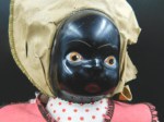 old black mask face cloth doll a